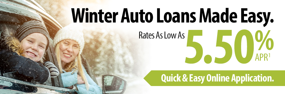 Winter auto loans made easy. Rates as low as 5.50% APR1. Photo of mom and son in car wearing winter clothes.